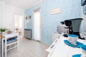 Kuchyň nebo kuchyňský kout v ubytování Apartment Casa Banko