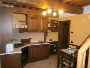 Kuchyň nebo kuchyňský kout v ubytování Agriturismo il Tiglio