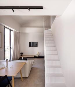 Televízia a/alebo spoločenská miestnosť v ubytovaní YOURS boutique stay