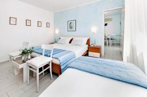 Postel nebo postele na pokoji v ubytování Apartment Casa Banko