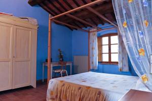 Posteľ alebo postele v izbe v ubytovaní Villa Le Ginestre