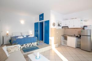 Kuchyň nebo kuchyňský kout v ubytování Folia Bianca Apartments