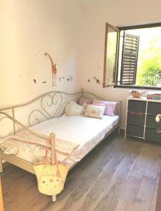 Un pat sau paturi într-o cameră la Vila Petra