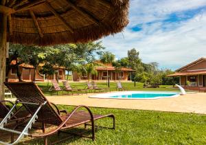 The swimming pool at or close to Rancho da Cachaça Pousada