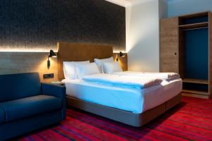 Ένα ή περισσότερα κρεβάτια σε δωμάτιο στο Kb Hotel