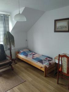 מיטה או מיטות בחדר ב-Siedlisko Pauza