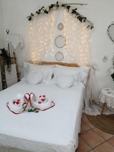 Ein Bett oder Betten in einem Zimmer der Unterkunft Il Gelsomino di Ossuccio