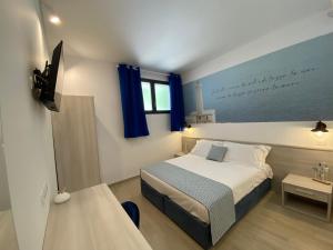Postel nebo postele na pokoji v ubytování LOASI room&relax