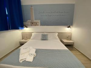 Postel nebo postele na pokoji v ubytování LOASI room&relax