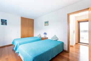 Katil atau katil-katil dalam bilik di Mindelo 3BDR Duplex House W/Pool +31 gambar