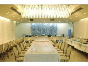 a large conference room with a long table and chairs at Osaka Bay Plaza Hotel - Vacation STAY 44083v in Sakai