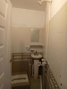 Ett badrum på Pearl Cottage Guest House
