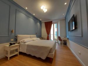 Posteľ alebo postele v izbe v ubytovaní Hotel Borgovico