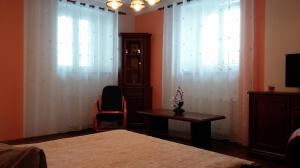 Rúm í herbergi á Apartman Nadezda