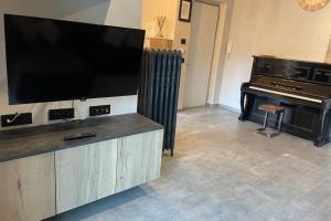 A television and/or entertainment centre at MATI HOME