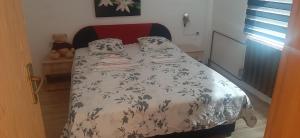 Posteľ alebo postele v izbe v ubytovaní Apartman Denis Una