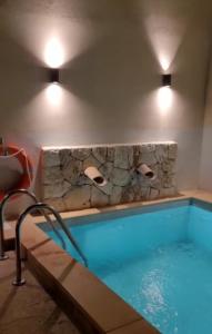 Majoituspaikassa Casal de Petra - Rooms & Pool by My Rooms Hotels tai sen lähellä sijaitseva uima-allas
