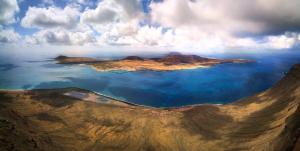 an aerial view of an island in the ocean at Vitalclass Lanzarote Resort in Costa Teguise