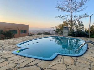 The swimming pool at or close to Pousada Alto da Serra