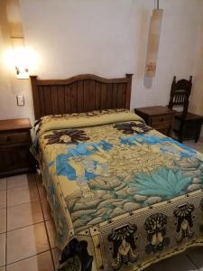 Katil atau katil-katil dalam bilik di Posada Bugambilias