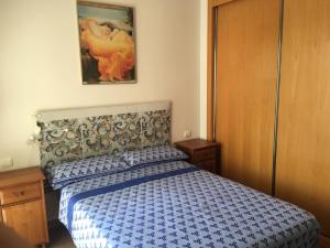 A bed or beds in a room at Apartamento Tania - El Toyo - Cabo de Gata