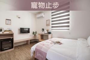 Voodi või voodid majutusasutuse Hibnb Guesthouse toas