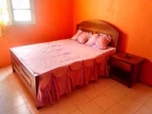 Postel nebo postele na pokoji v ubytování TULEAR APPARTEMENTS CHAMBRES Rez de chaussée et Etage