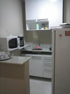Cuisine ou kitchenette dans l'établissement Studio Copacabana