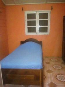Postel nebo postele na pokoji v ubytování TULEAR APPARTEMENTS CHAMBRES Rez de chaussée et Etage