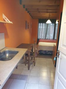 
A kitchen or kitchenette at Duclout comfort inn
