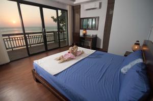 Ένα ή περισσότερα κρεβάτια σε δωμάτιο στο Penn Sunset Villa 10 with Shared Pool +18 φωτογραφίες