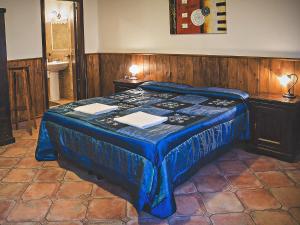 A bed or beds in a room at Bed and Breakfast Ichnos