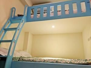 Letto o letti in una camera di 墾丁舍廷親子會館 KT13 Hotel