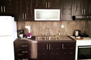A kitchen or kitchenette at Xristina's Experience
