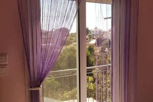 A balcony or terrace at Xristina's Experience