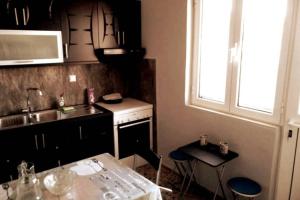 A kitchen or kitchenette at Xristina's Experience