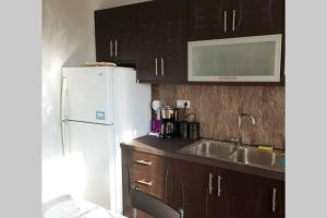 A kitchen or kitchenette at Xristina's Experience