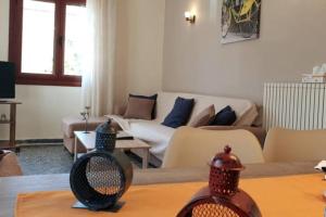 A seating area at Xristina's Experience