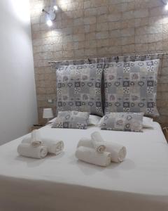 Postel nebo postele na pokoji v ubytování O'Paisi Casa Vacanze