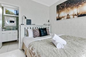 Postel nebo postele na pokoji v ubytování Coral Inn Boutique Resort + 37 fotografií