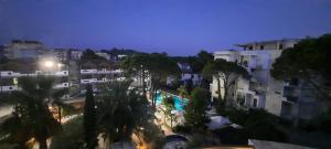 a view of a city at night with buildings at Lovely Apartment in Golem