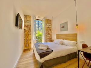 Posteľ alebo postele v izbe v ubytovaní Mirandoalaconcha Rooms