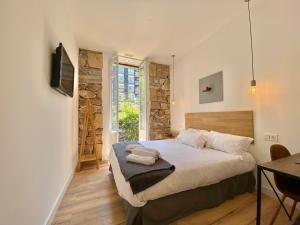 Posteľ alebo postele v izbe v ubytovaní Mirandoalaconcha Rooms