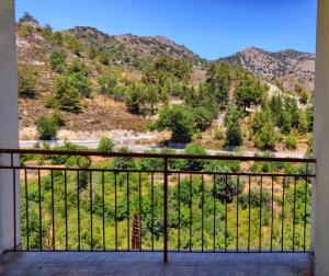 a balcony with a view of a mountain at Το Σπίτι του Προκόπη in Nicosia