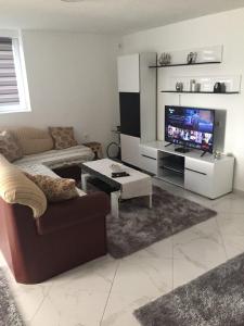 TV a/nebo společenská místnost v ubytování Planet Rooms