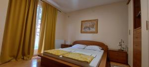 Voodi või voodid majutusasutuse Apartment Vladan toas