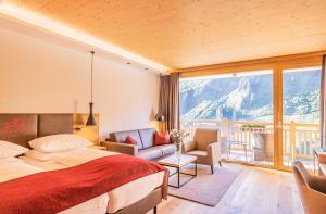 Postel nebo postele na pokoji v ubytování Damülser Hof - Wellness & Spa Superior