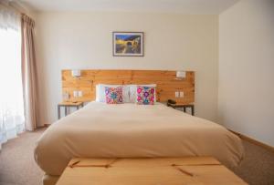 Cama ou camas em um quarto em Cooper Hotel Boutique