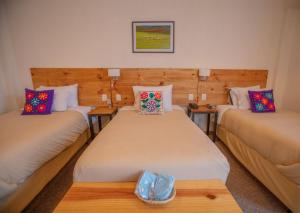 Cama ou camas em um quarto em Cooper Hotel Boutique