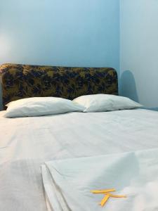 Voodi või voodid majutusasutuse Kataryn Hostel toas